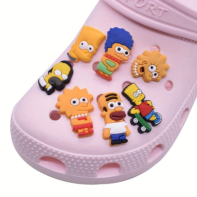 Colourful cartoon charms styled on pink clogs